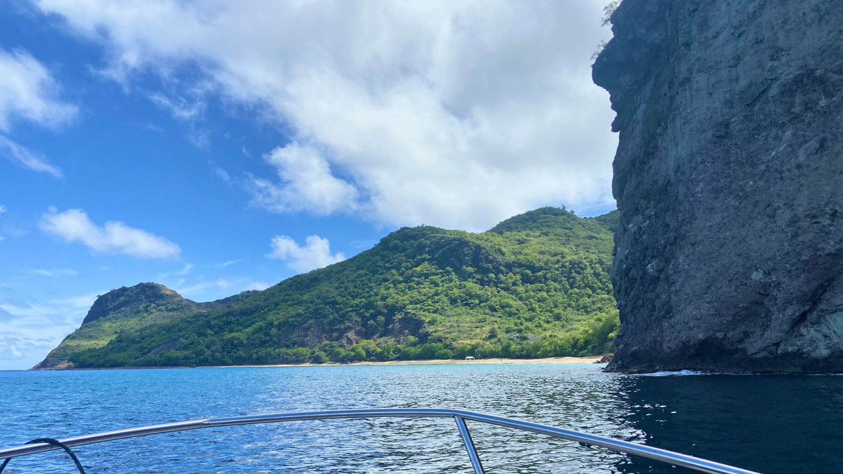 heading to Rendezvous Beach by boat from Little Bay